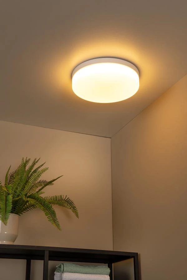 Lucide BISKIT - Flush ceiling light Bathroom - Ø 34,5 cm - LED - 1x24W 2700K - IP44 - Motion & Day/Night Sensor - White - atmosphere 1